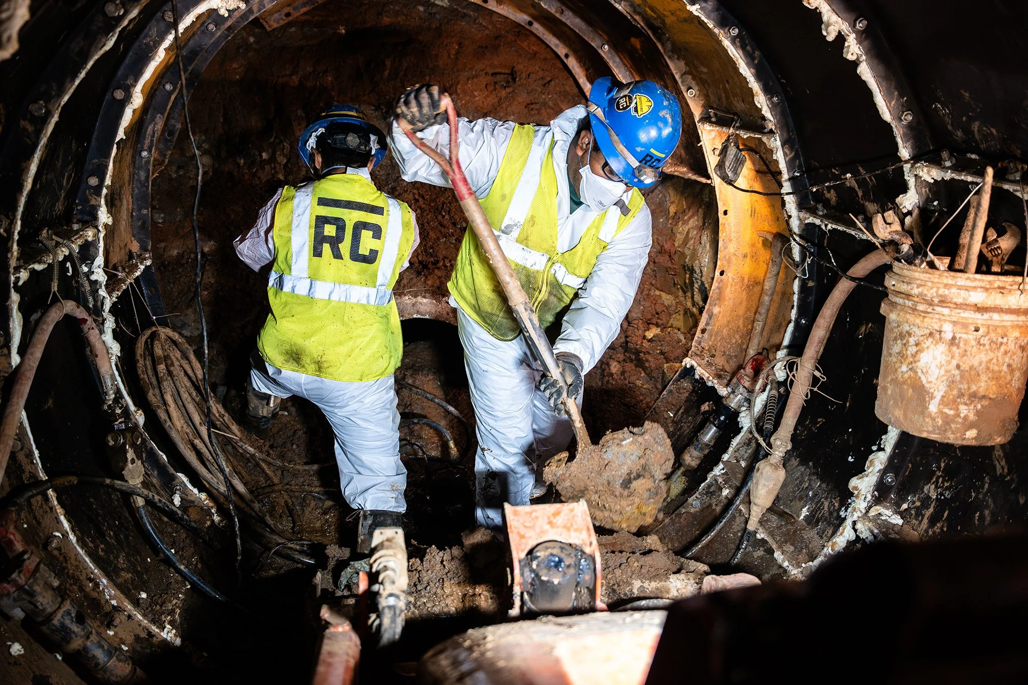 construction workers in underground tunnel