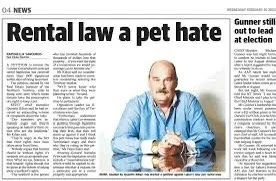 A newspaper article titled 'Rental law a pet hate' with a photo of a man wearing a blue shirt sitting at a desk.