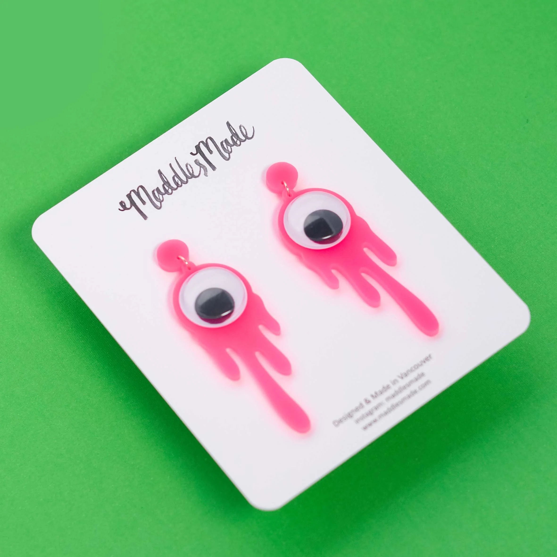 Acrylic Jewellery 'I See You' Earrings in neon pink close up shot