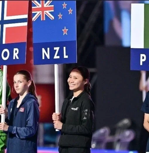 AB TKD Member Franchette Duka NZ Flag Bearer at World Poomsae Champs