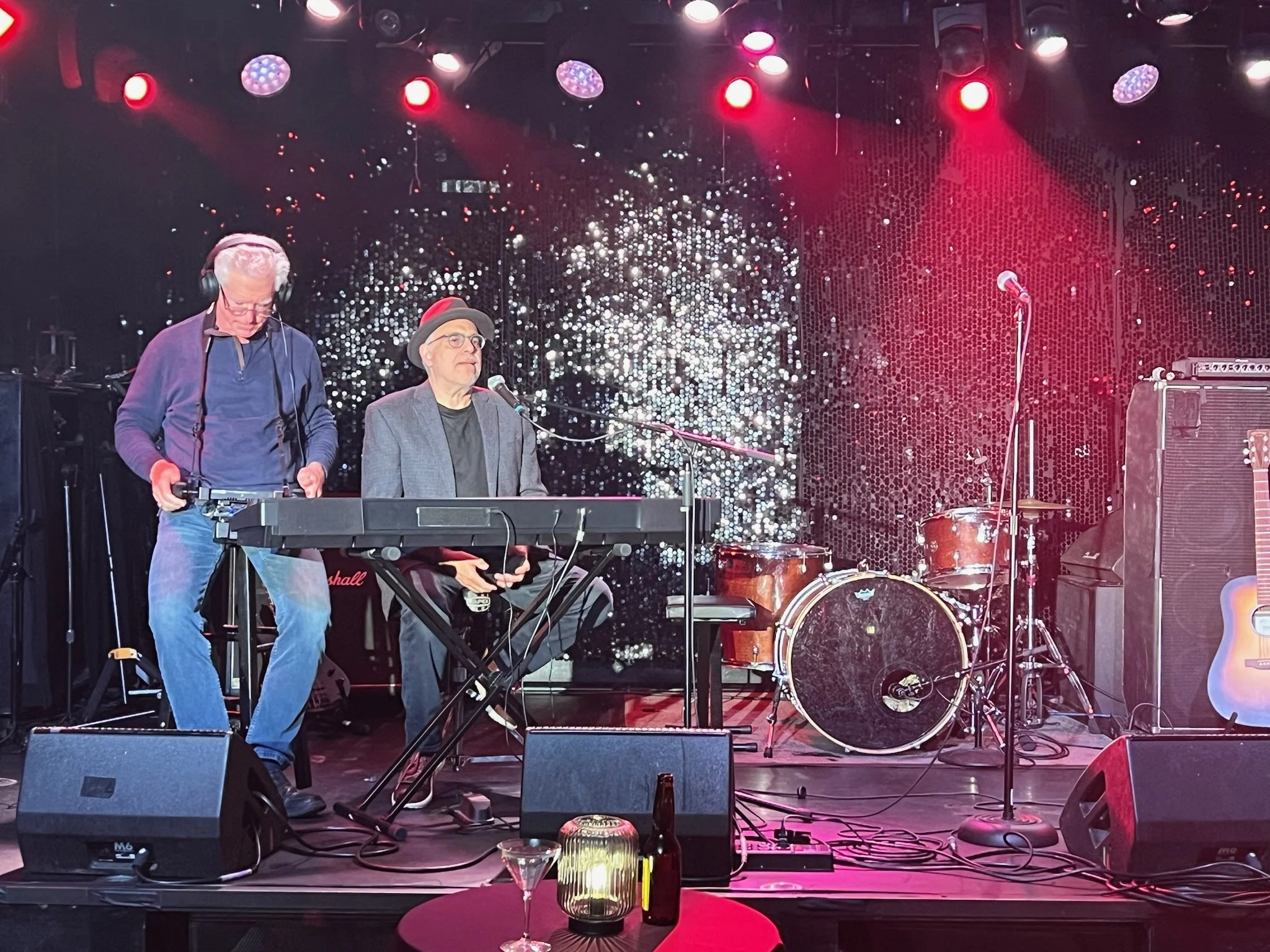 Director Gregory Jbara watching the monitor while David Yazbek as Hugo gives lines off camera.