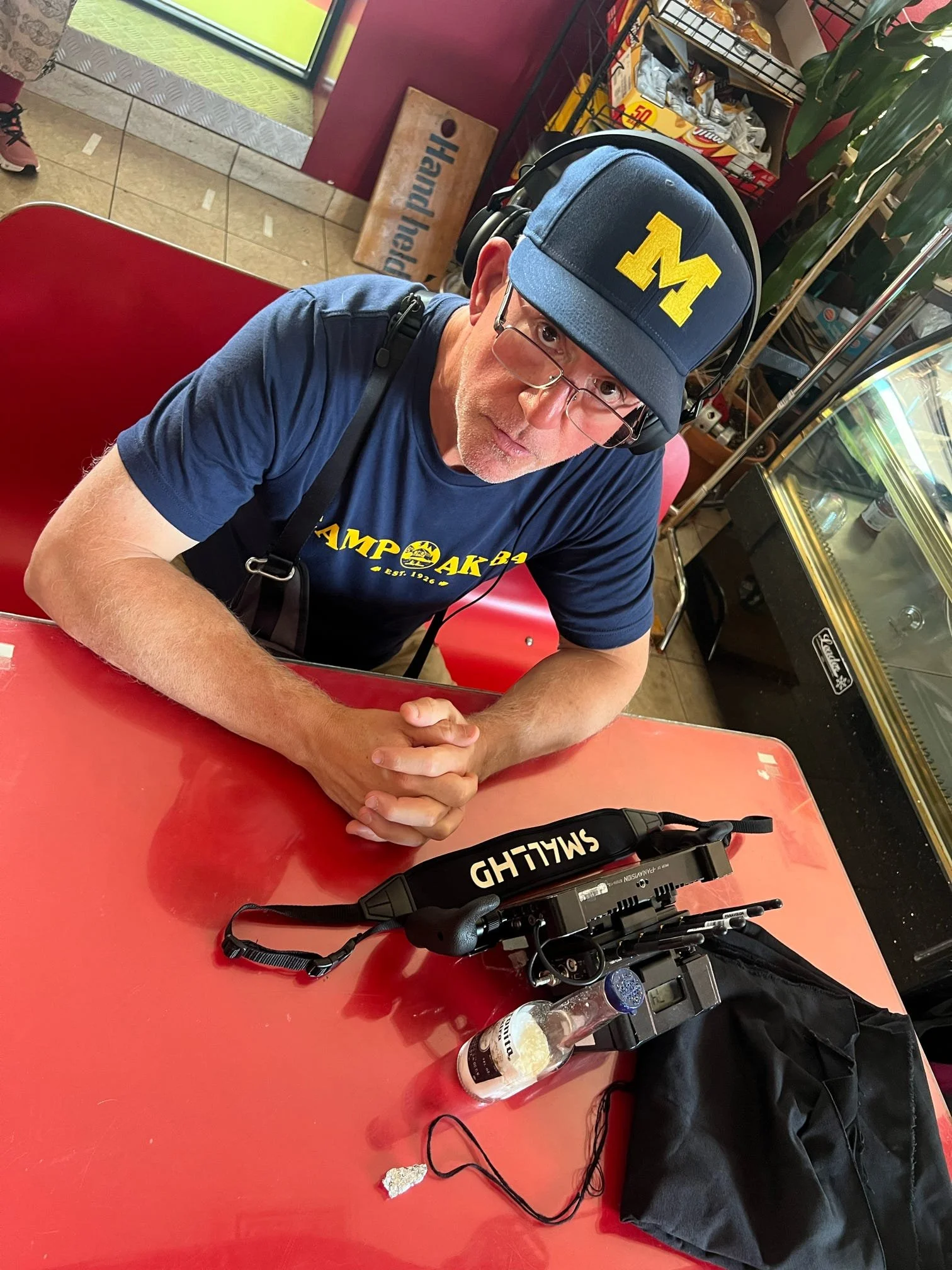 Is he watching the actors or the MICHIGAN game?