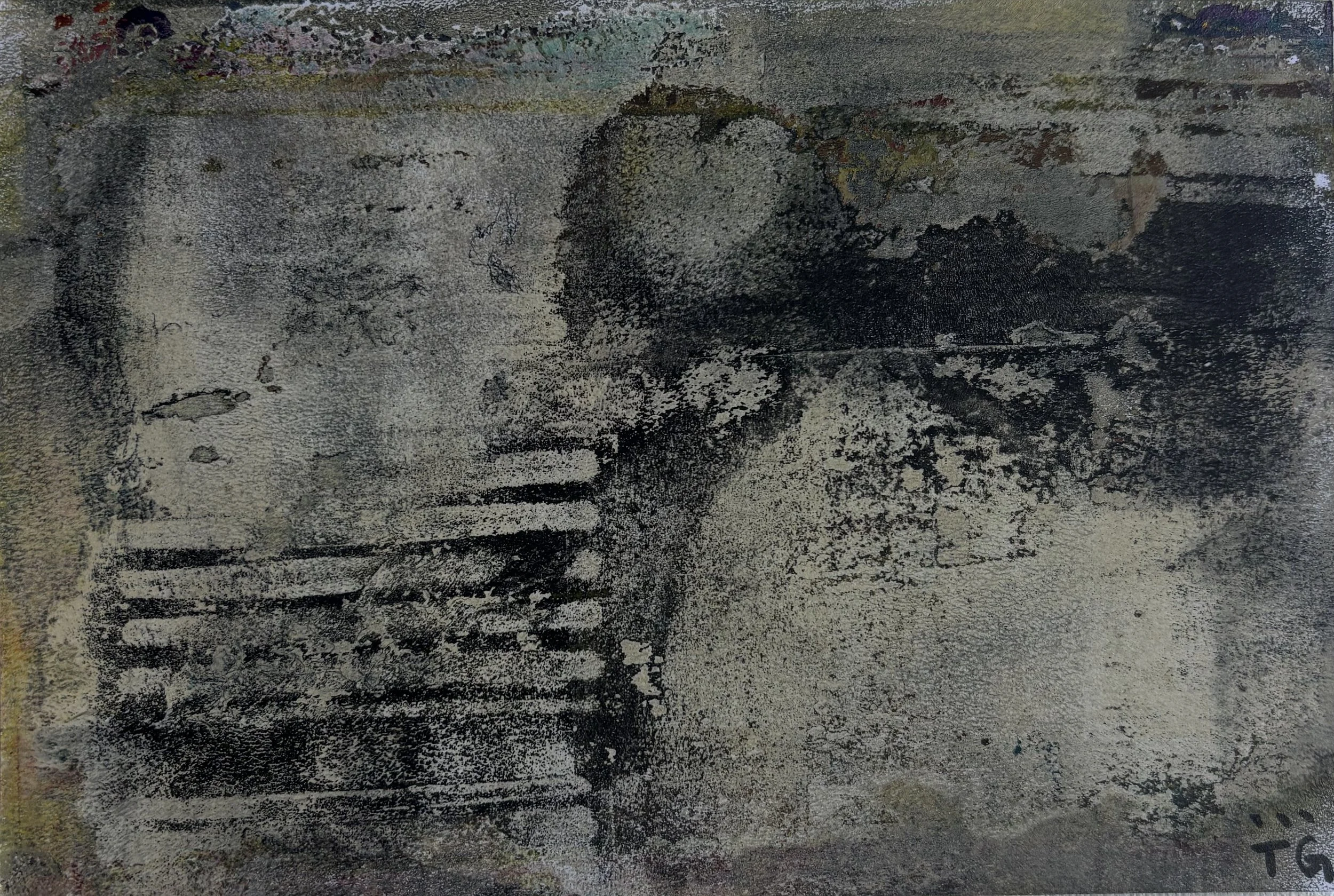 A weathered and textured concrete surface with patches of black, gray, and off-white, exhibiting cracks and stains.