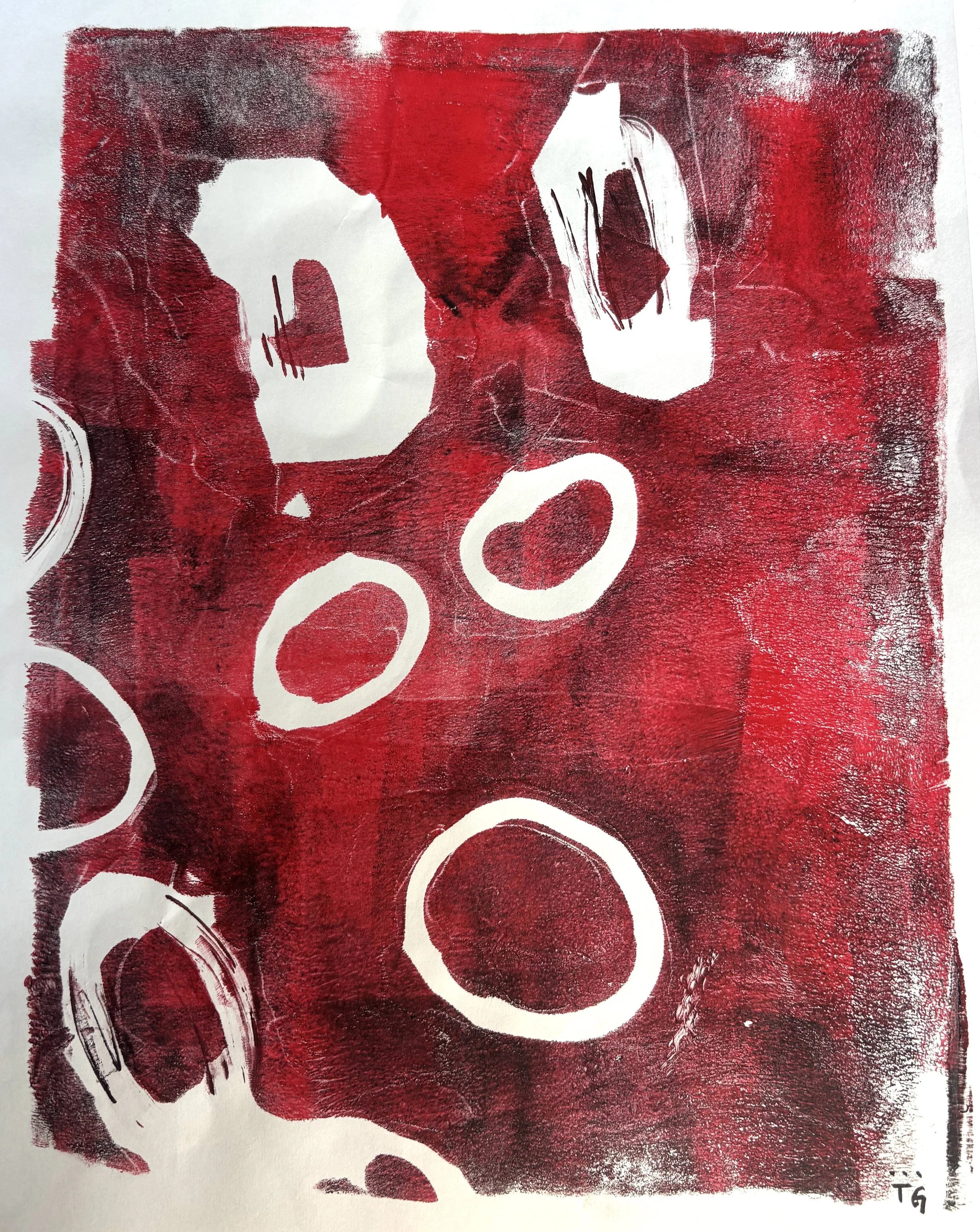 Abstract artwork with red and white colors, featuring white circular and oval shapes on a textured red background.