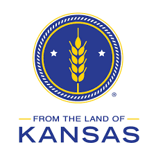 State emblem of Kansas featuring wheat stalks, stars, and a blue background with the text 'From the Land of Kansas'.