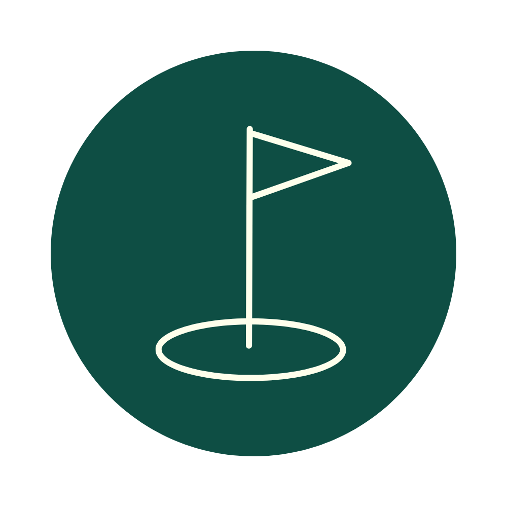 Icon of a golf hole with a flag on a circular green background