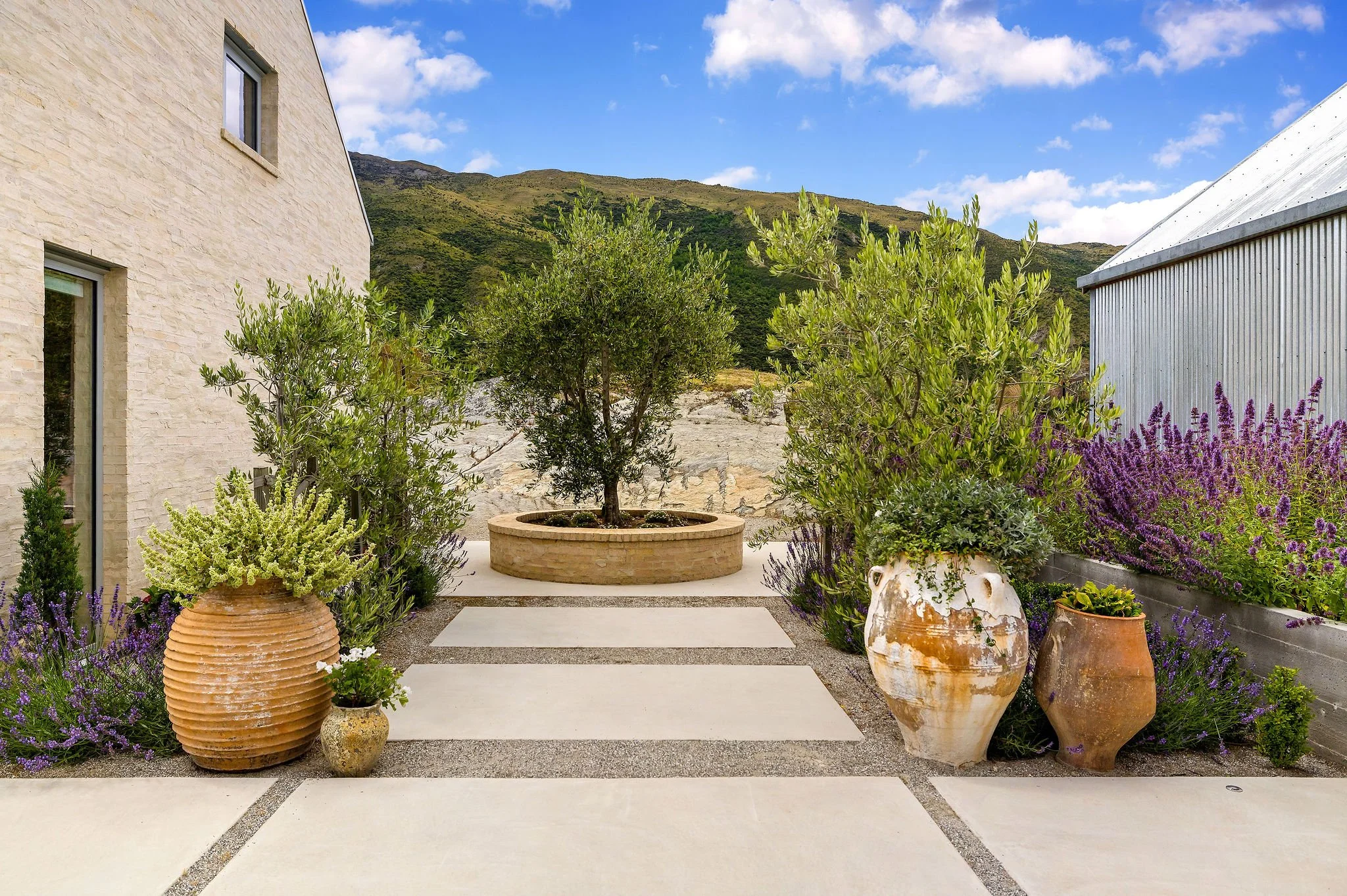 Feature landscaping details at Peregine Ridge, a Gibbston Valley home built by Diemarco Builders Queenstown.