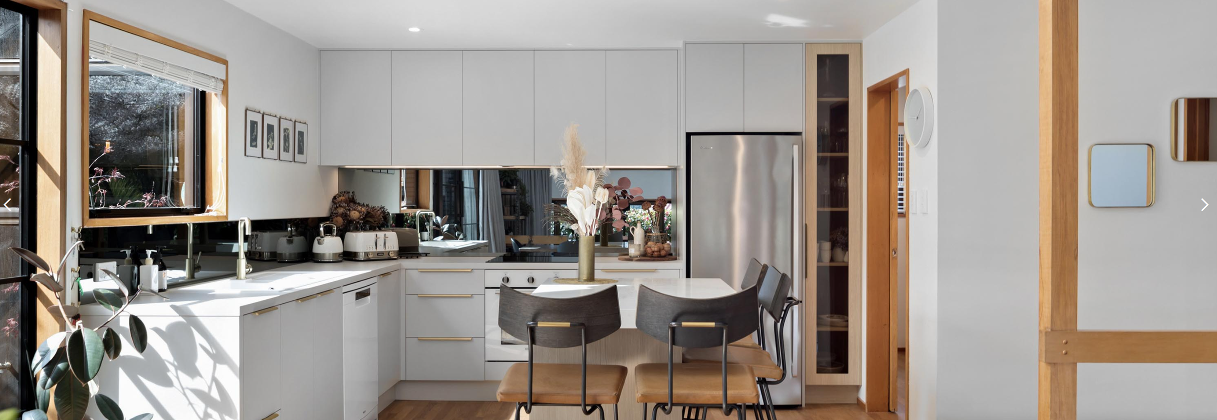 A stunning white kitchen in a residential renovation by Diemarco Builders Queenstown.