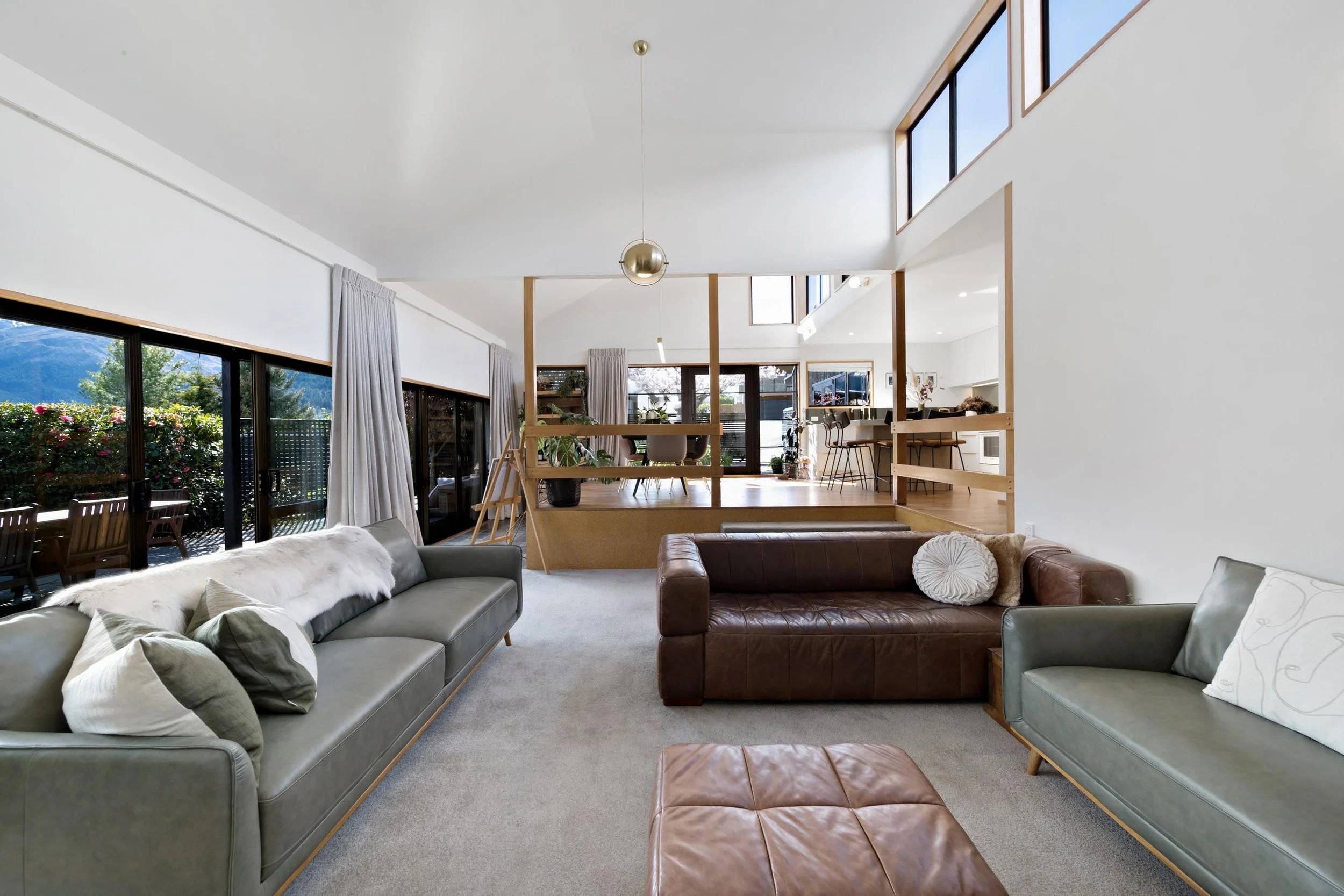 The open plan lounger area at a residential renovation in Kelvin Heights by Diemarco Builders Queenstown.