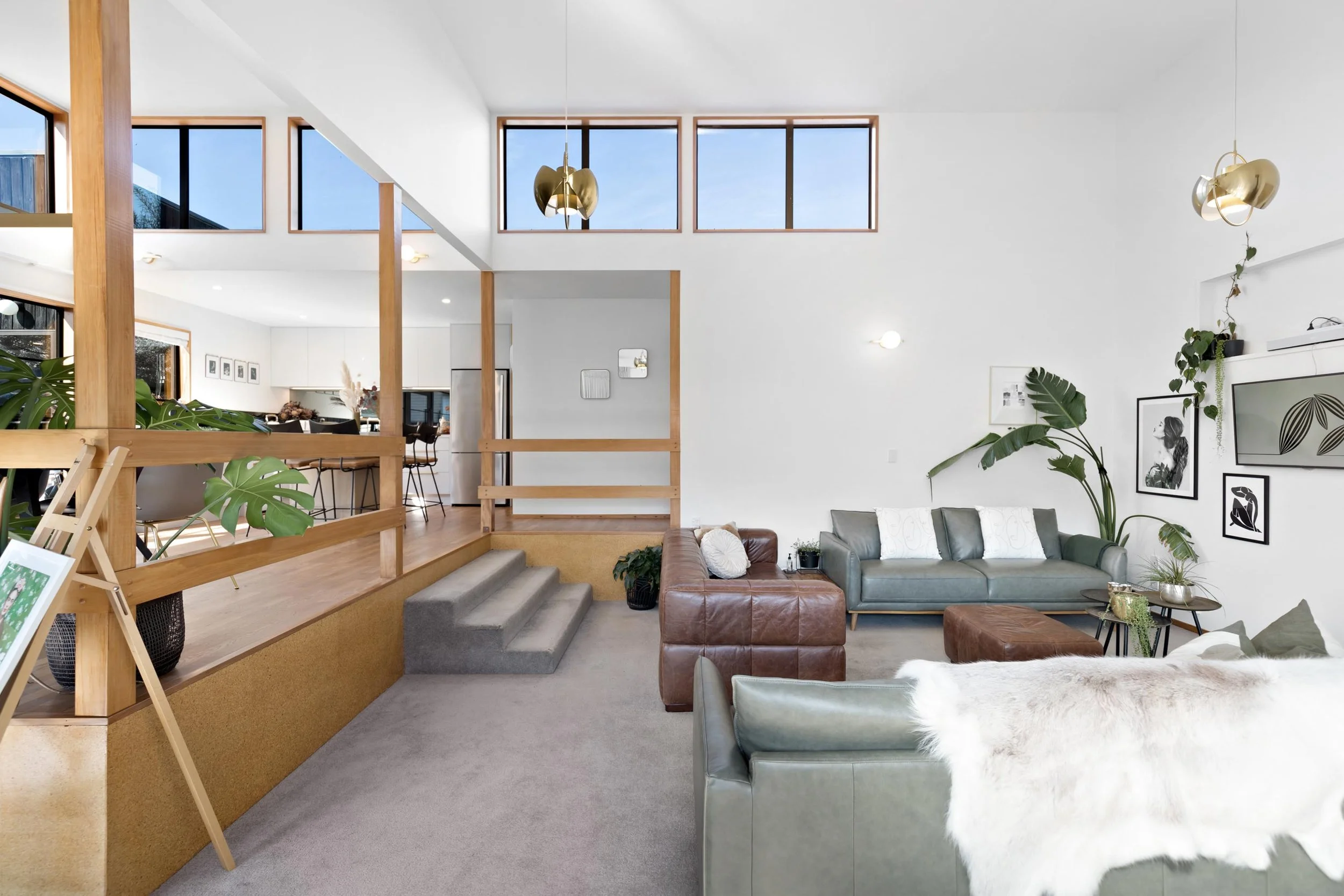 A light bright open plan lounge space at a residential renovation in Kelvin Heights by Diemarco Builders Queenstown.