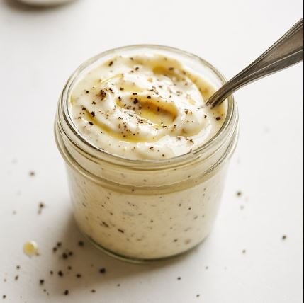 CREAMY GARLIC DRESSING - CALORIES:227 / P:25 F:9 C:10