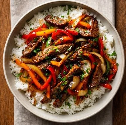 BEEF STIR-FRY WITH WHITE RICE - CALORIES: 613P:52g F:16g C:63g