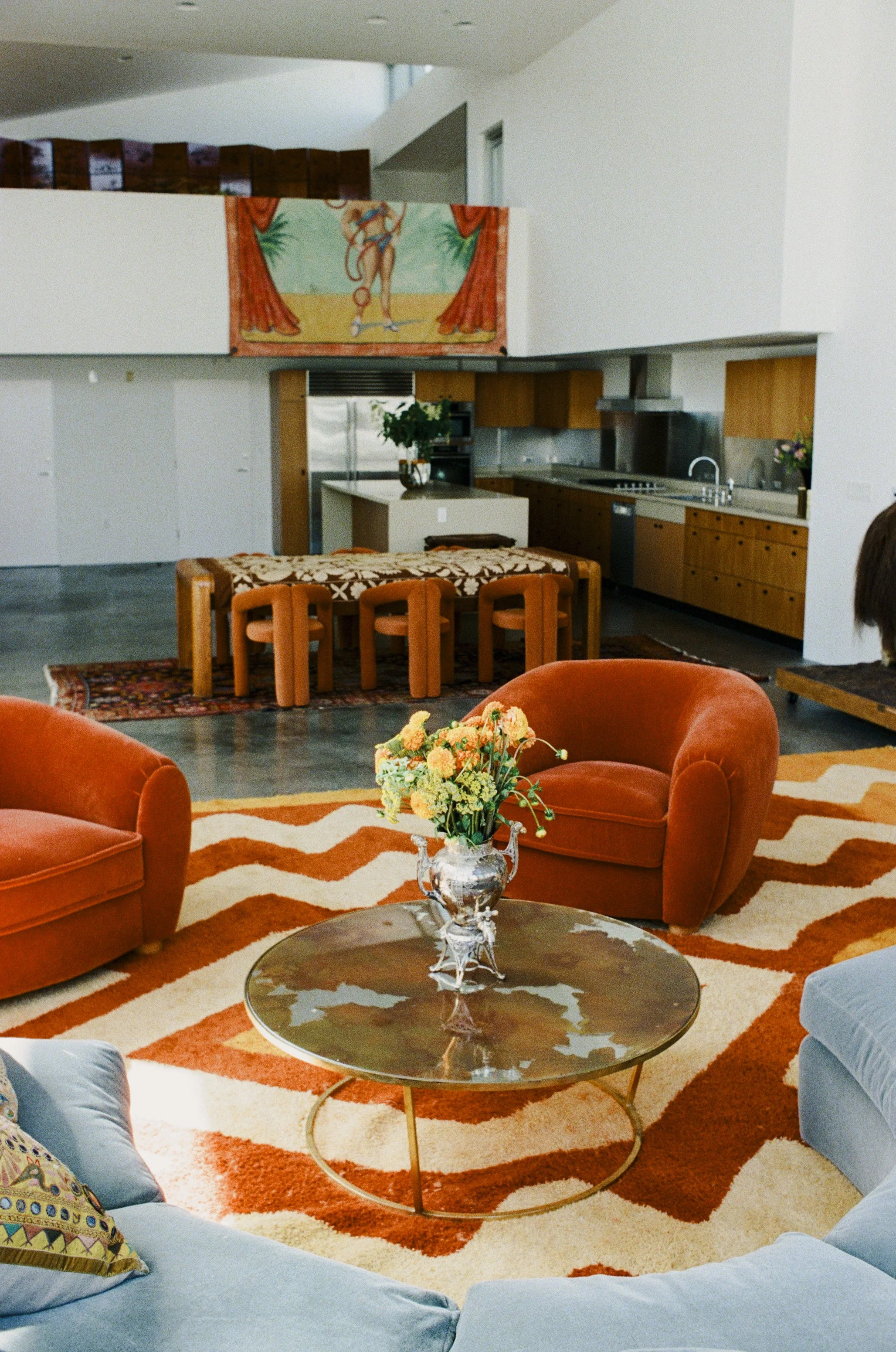 loft-4-round-dining-orange-chairs-venice-beach.jpg