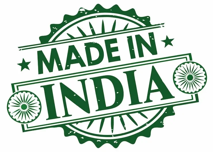 Green stamp featuring text 'Made in India' with stylized sun rays and Indian national symbols.