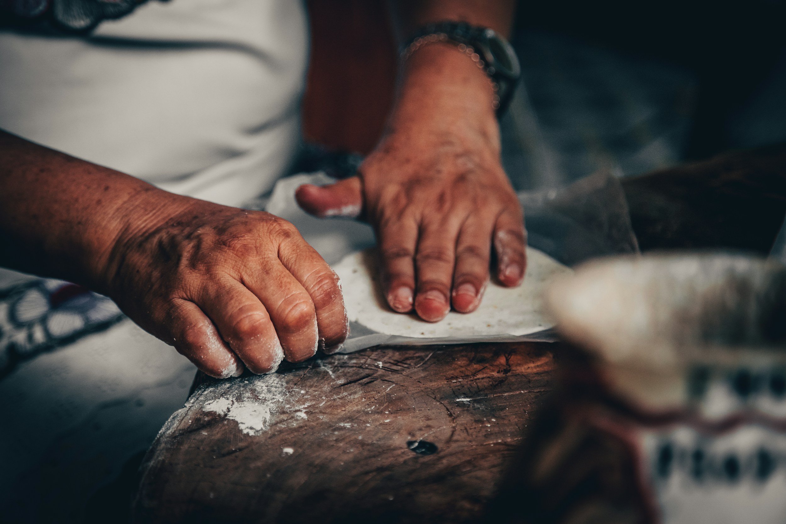 A pair of working hands, suggesting years of quiet effort.