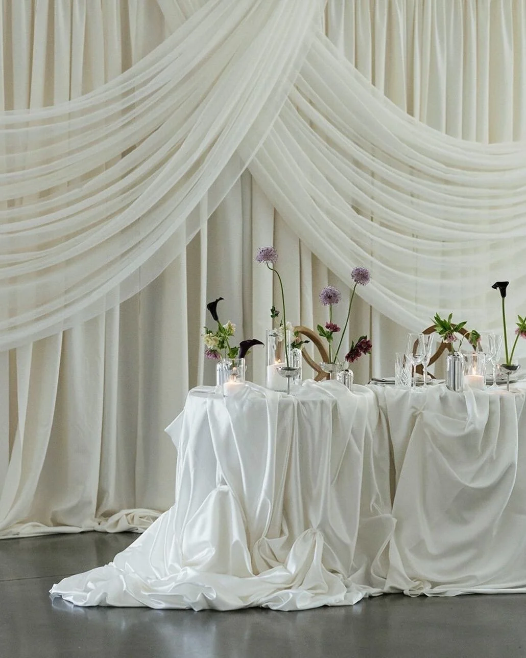 Draped tablescape decor at wedding reception hosted by brisbane's best mc, celebrant and day-of coordinator