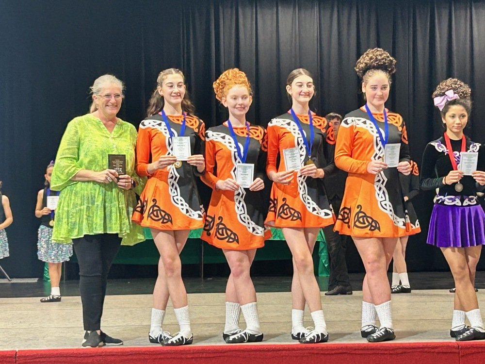 Kathy and girls onstage.JPG