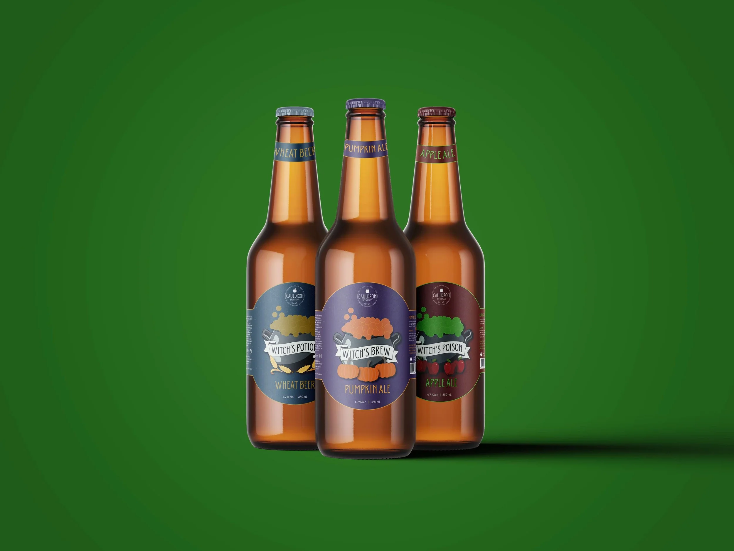 Three amber beer bottles with themed labels for wheat beer, pumpkin ale, and apple ale, displayed upright against a green background.