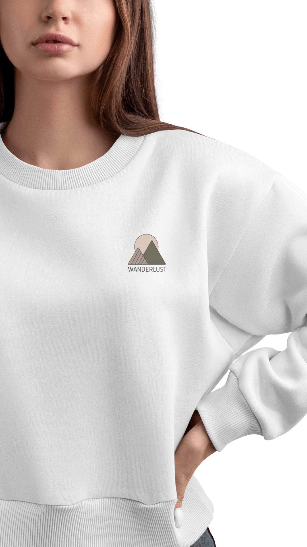 Person wearing a white sweatshirt with a minimalist mountain design and the word ‘WANDERLUST’ on the chest.