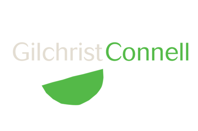 Logo with the text 'Gilchrist Connell' and a green semicircular shape beneath the text.