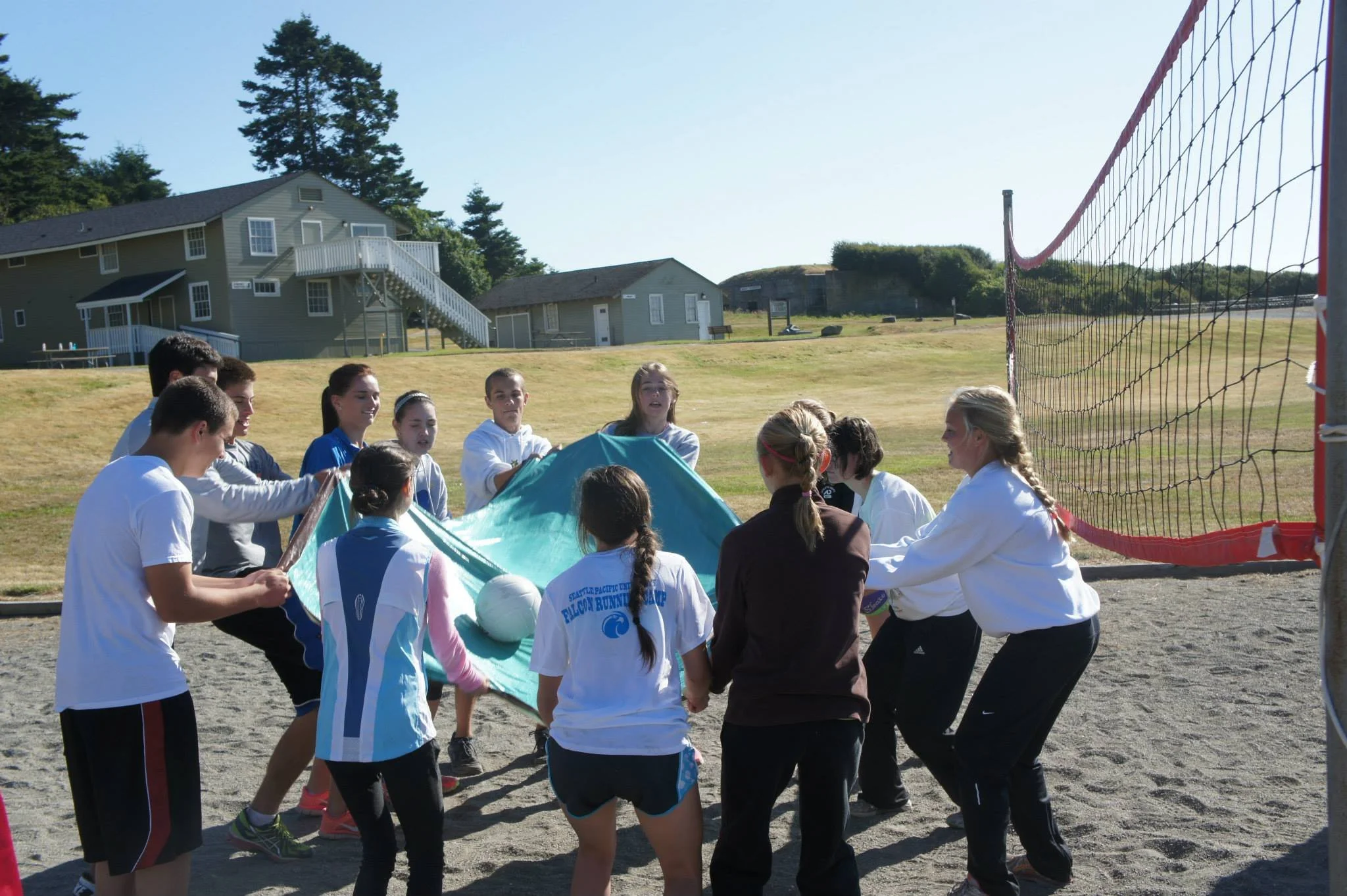 A group of children and teens playing at Fort Casey Running Camp - Youth Running Camp