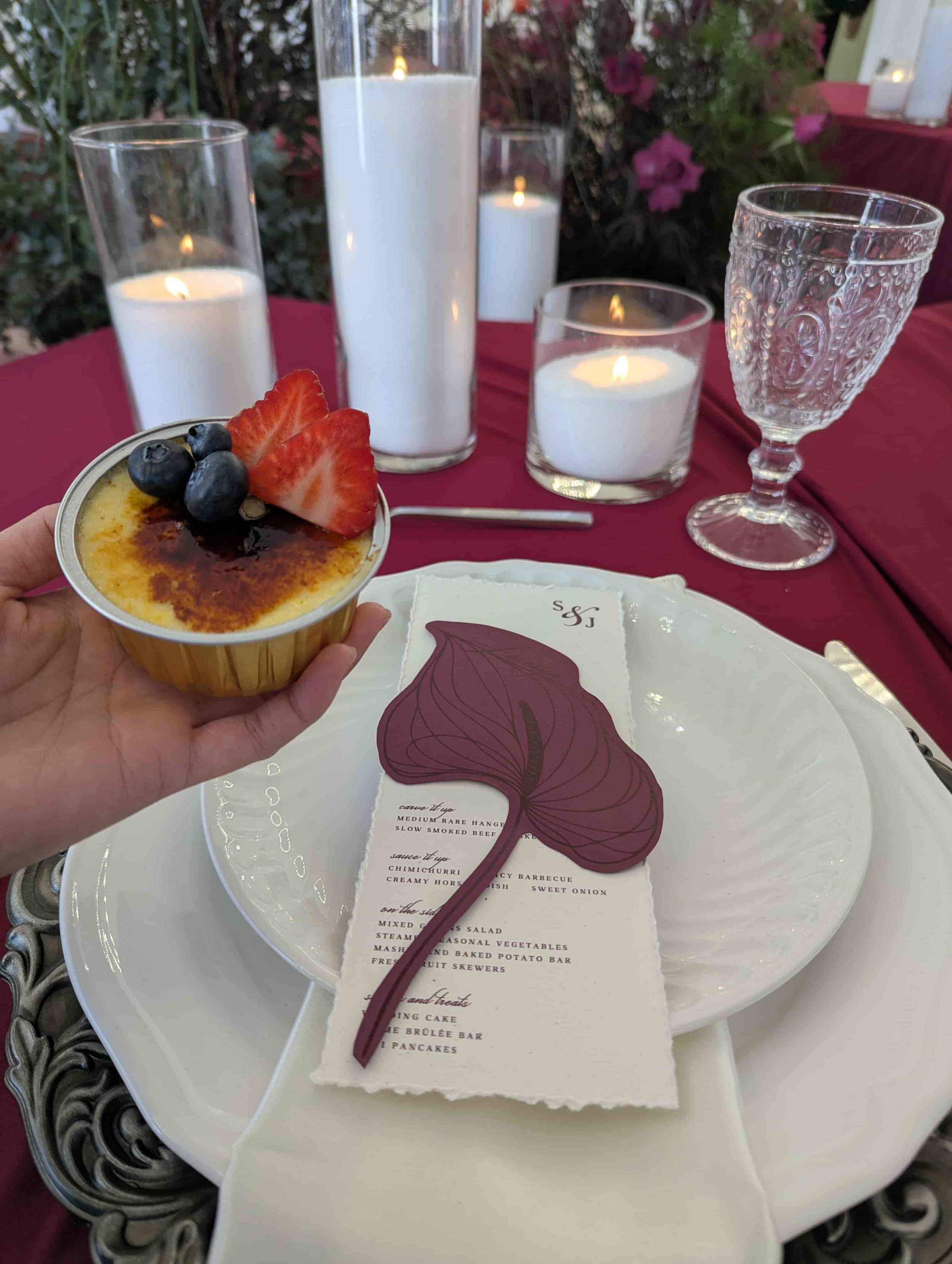 Close-up of crème brûlée dessert with elegant wedding table setting in Los Angeles and Orange County