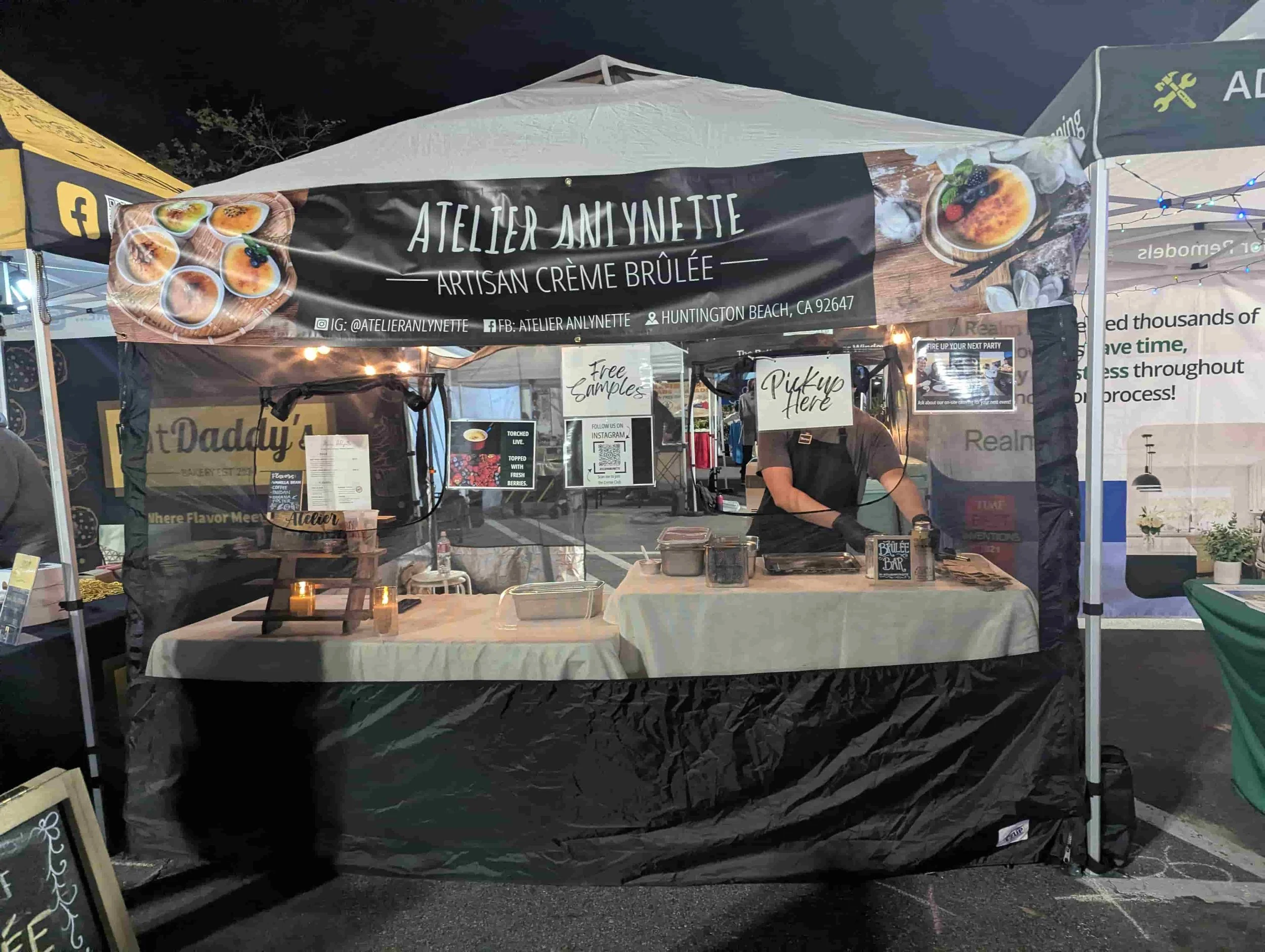 Crème brûlée dessert bar booth at a night market in Huntington Beach Orange County featuring live torching service