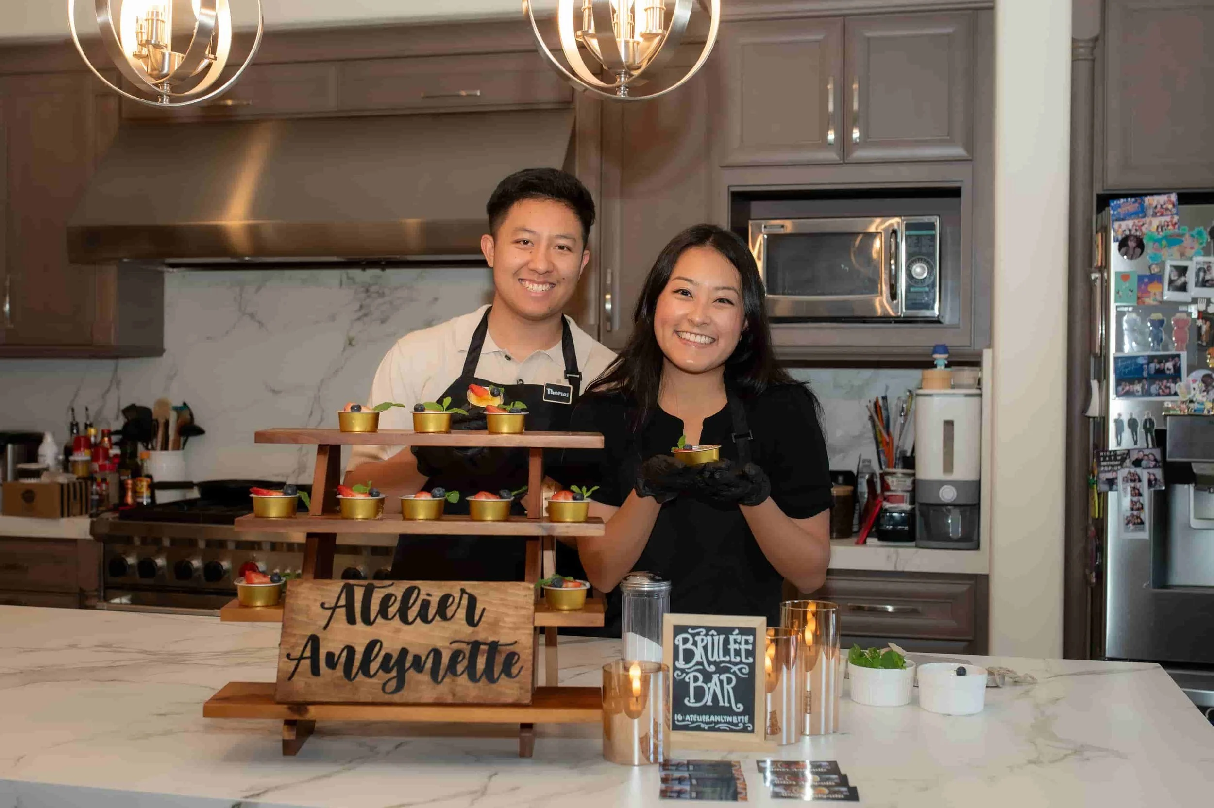 Atelier Anlynette crème brûlée dessert bar catering team presenting mini desserts in Orange County