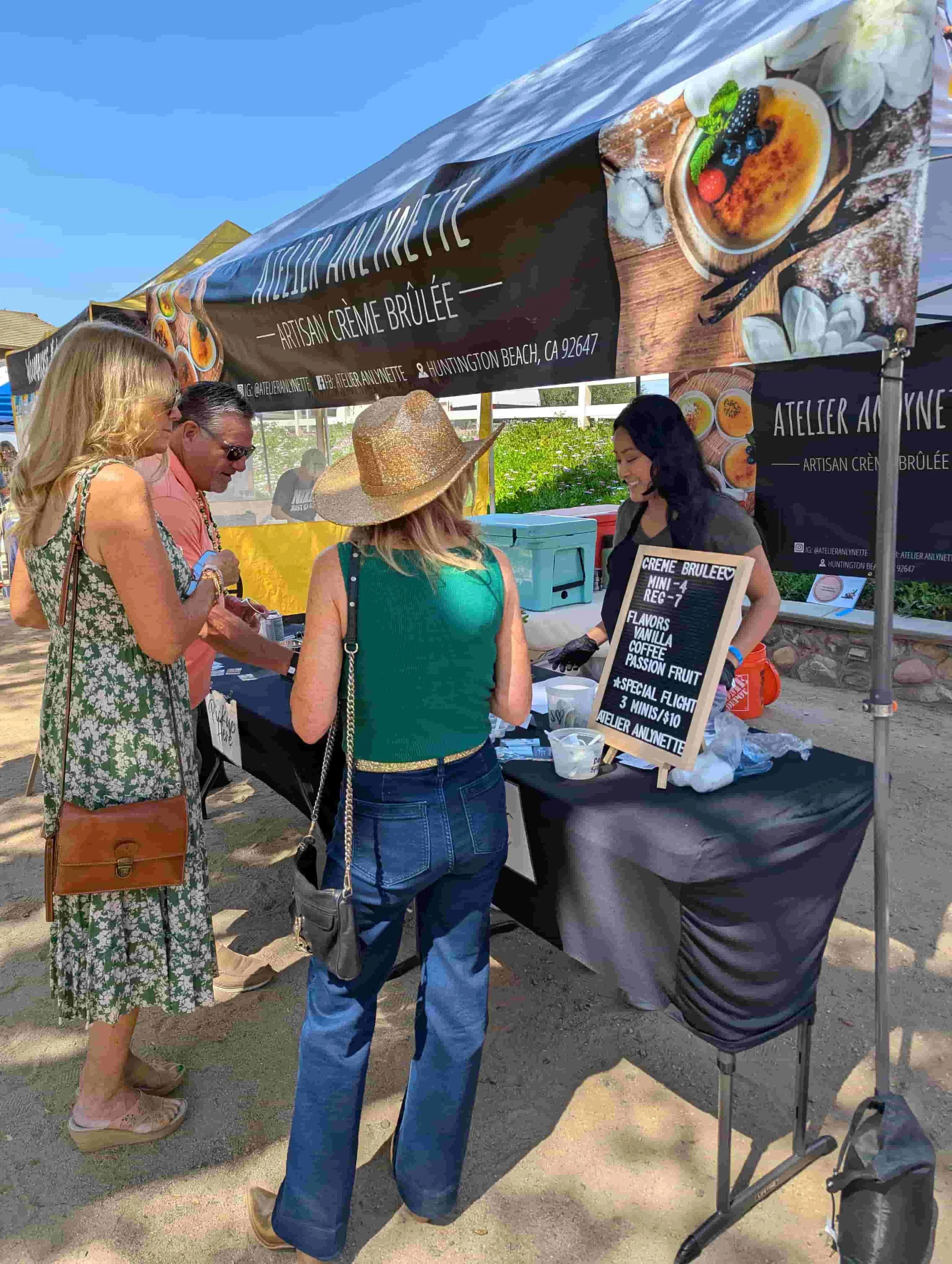 Artisan crème brûlée stand by Atelier Anlynette serving guests at an outdoor event