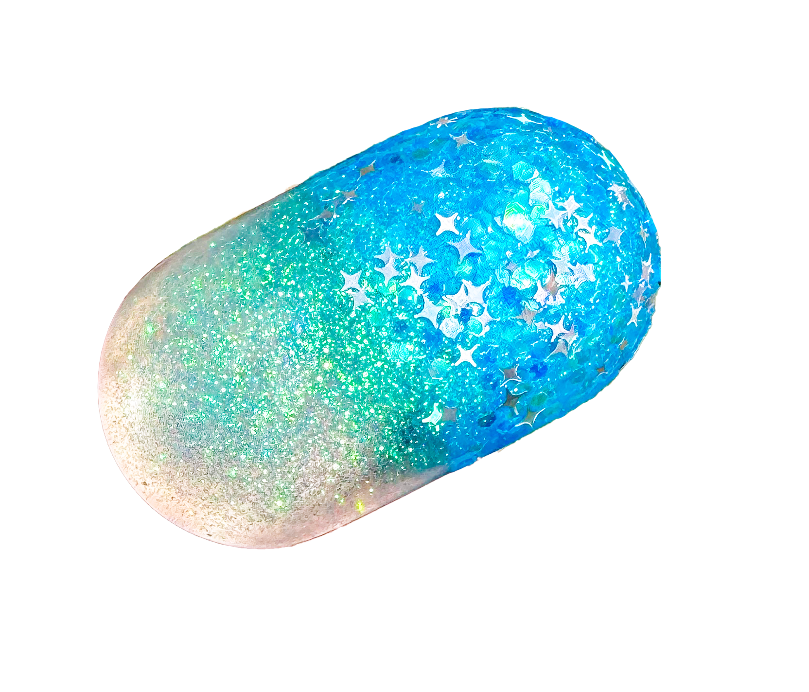 A close-up of a acrylic resin pill with a holographic, glittery finish in shades of blue, green, and pink, on a black background.