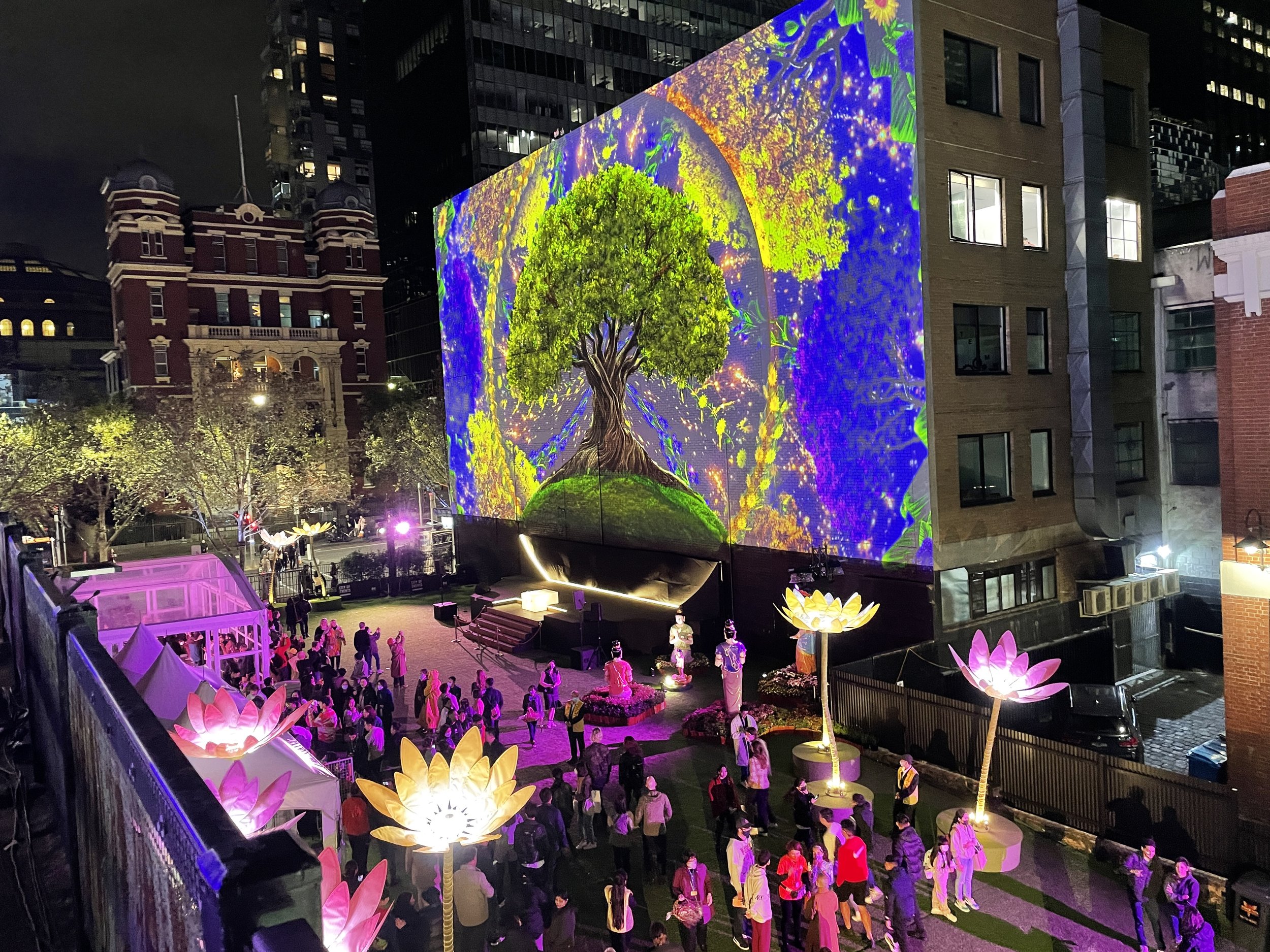 Architectural projection mapping across a city-square facade
