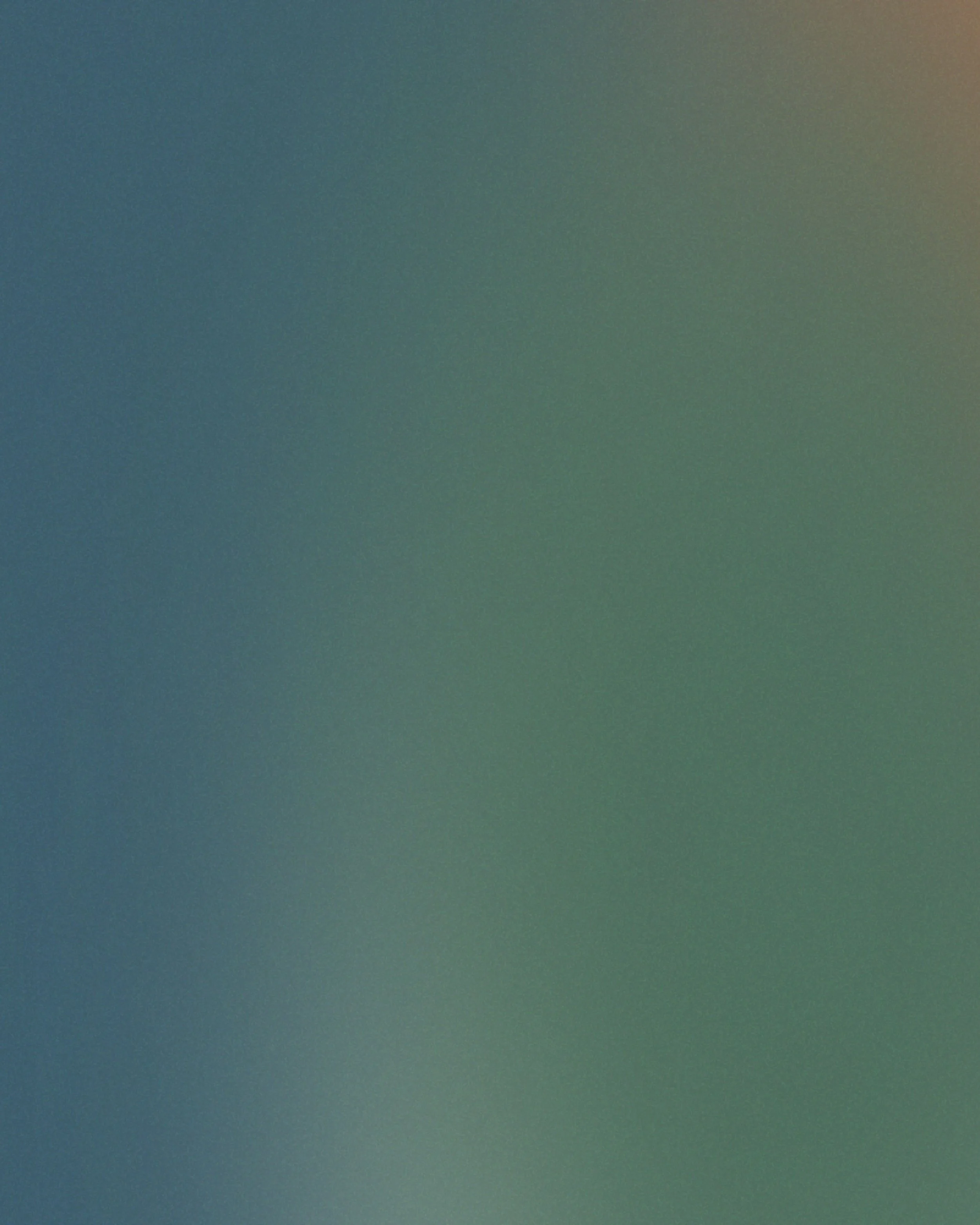 A blurred gradient background with shades of blue, green, and beige.