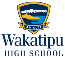 Logo of Wakatipu High School featuring a shield with a mountain, water, and a flag, with the school's name below.