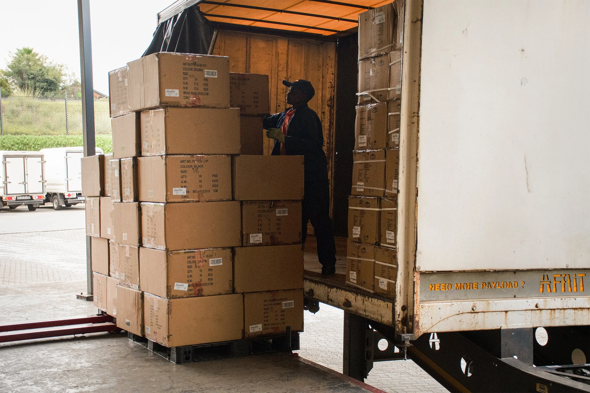 Logistics officer packing the truck