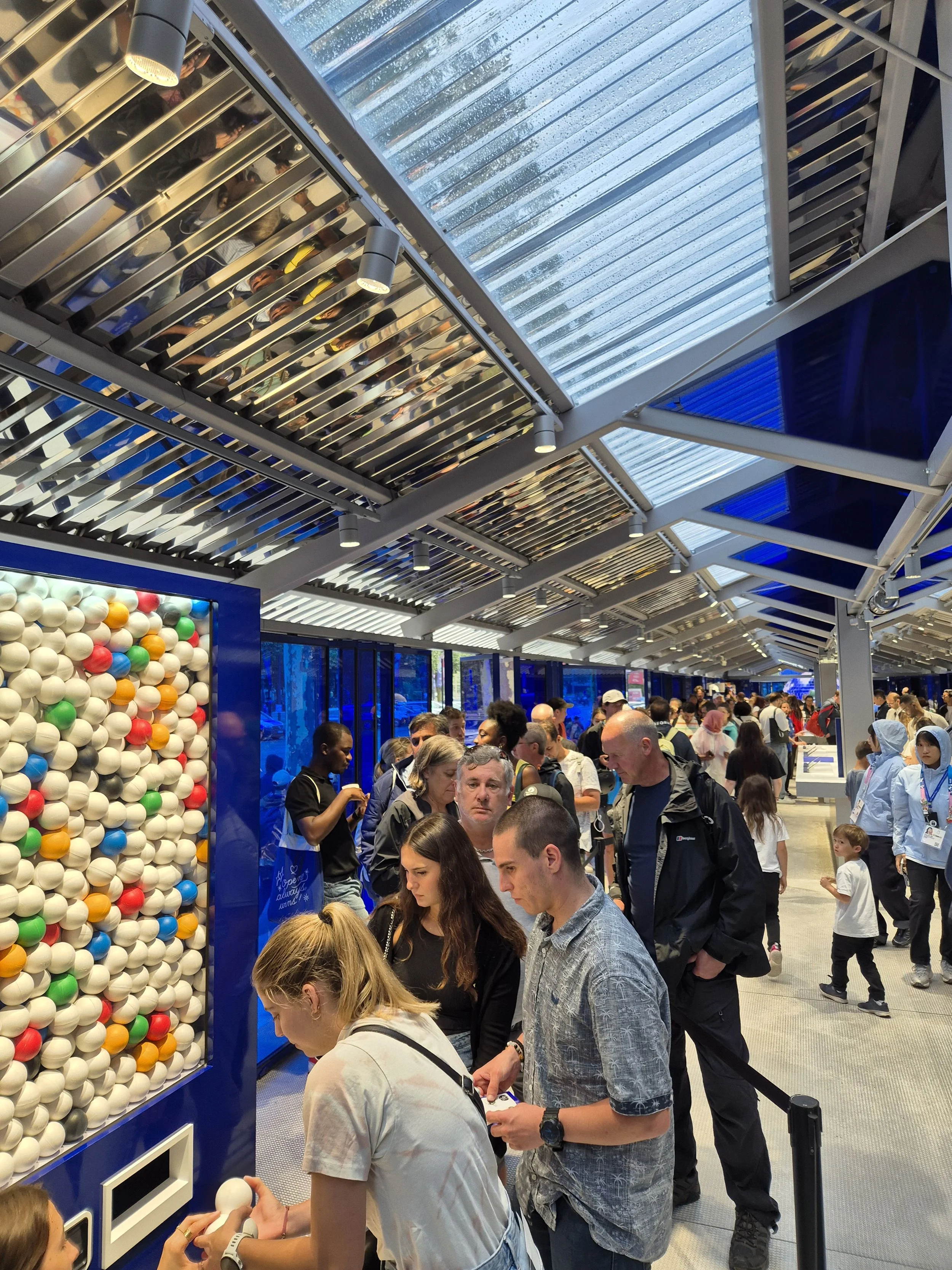 Busy Crowd at Samsung Olympic Rendez-vous Paris 2024 featuring Sustainable Pulp Mold Gacha Machines manufactured by KimShin