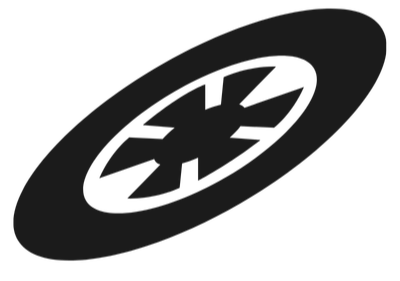 A close-up of a black tire with a stylized snowflake symbol in the center.