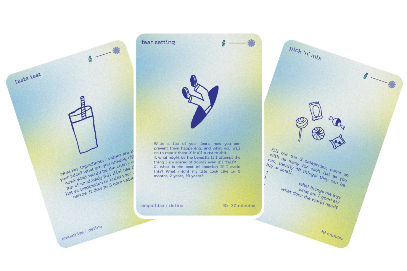 Three colorful cards with prompts for self-reflection and personal growth, including a drink, a hand, and assorted snacks or candies.