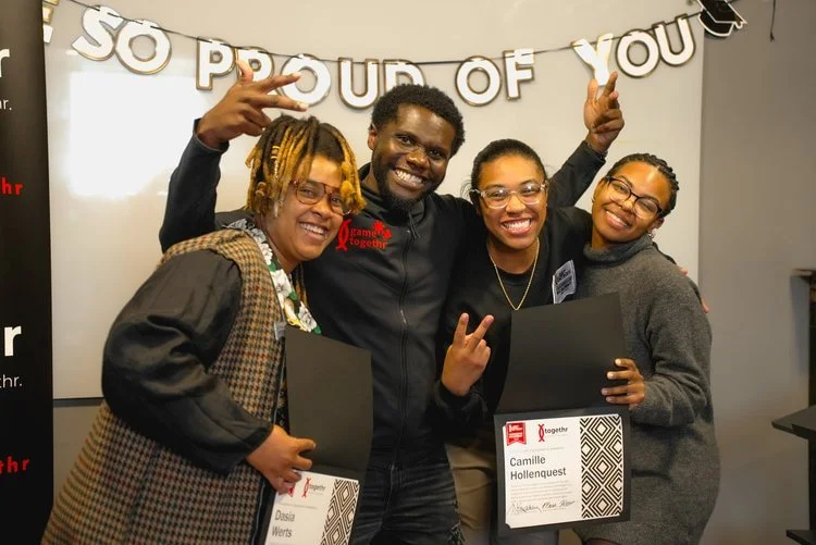 Four diverse young adults celebrating, holding certificates, with a banner reading 'So Proud of You' in the background.
