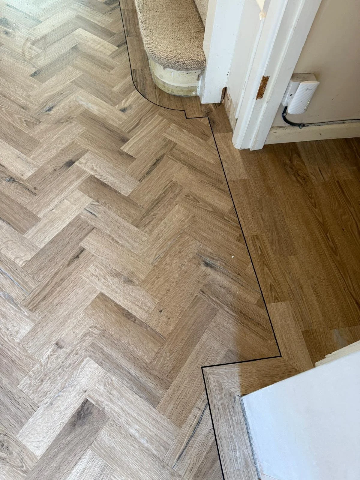Entrance hall and cupboard installed with Karndean knight tile natural traditional oak