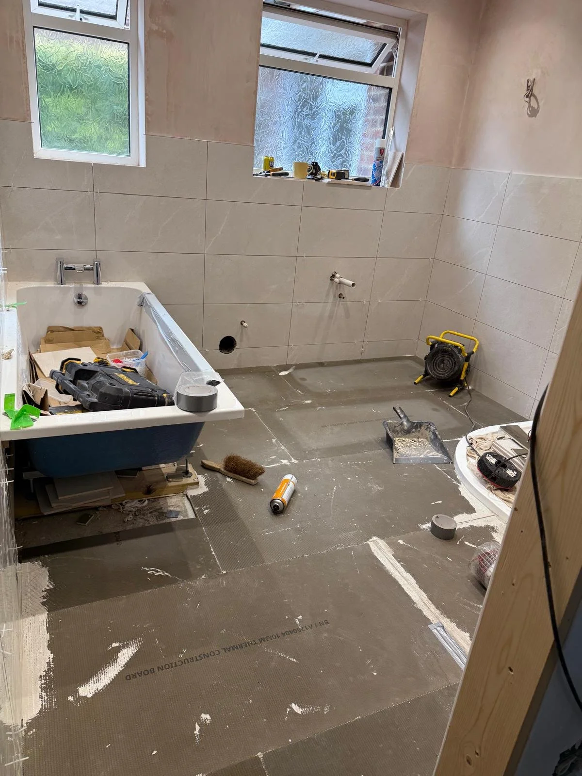 10 mm insulation boards installed with flexible tile adhesive ready for Devi electric heating system to be installed