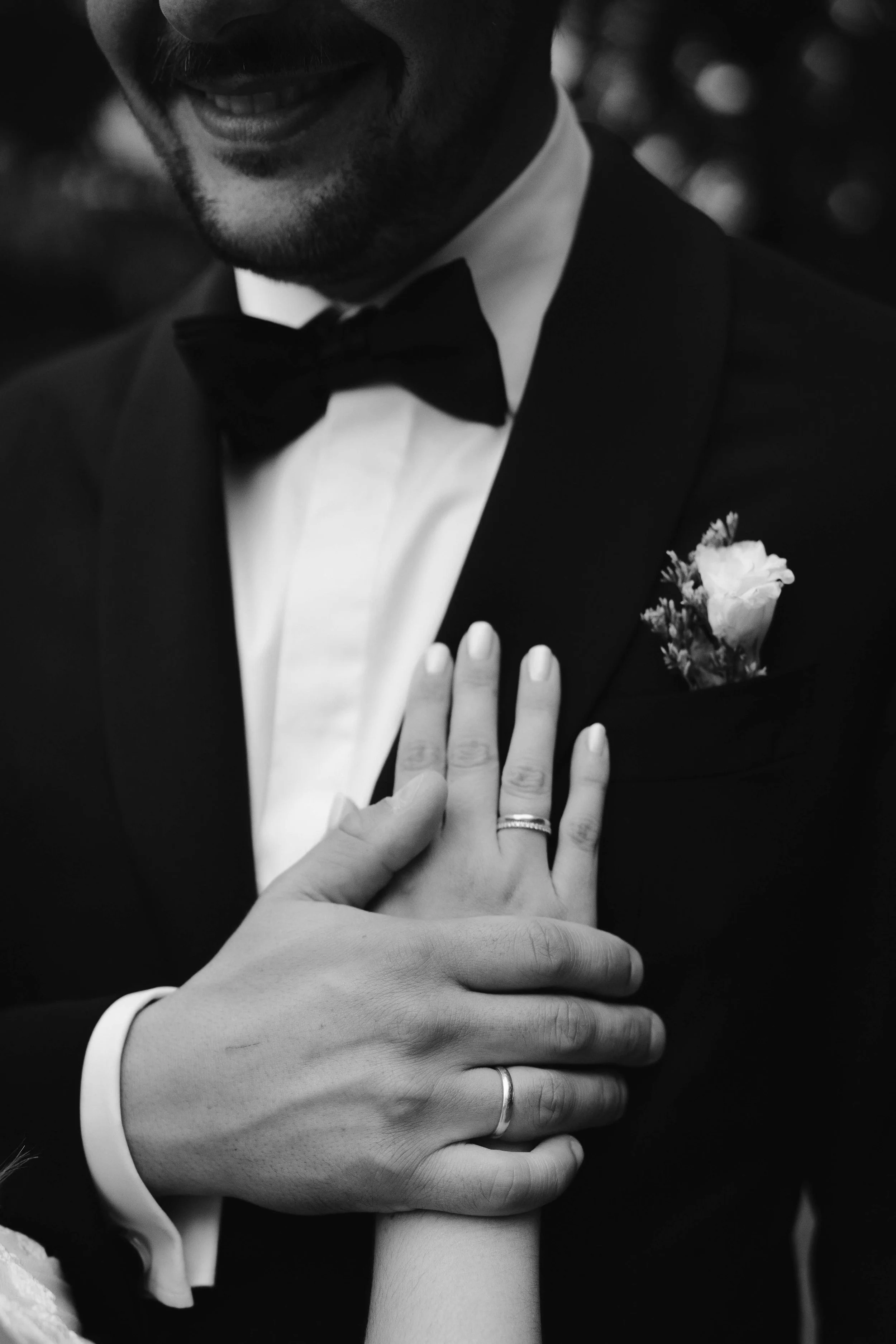 bride-hand-on-grooms-chest