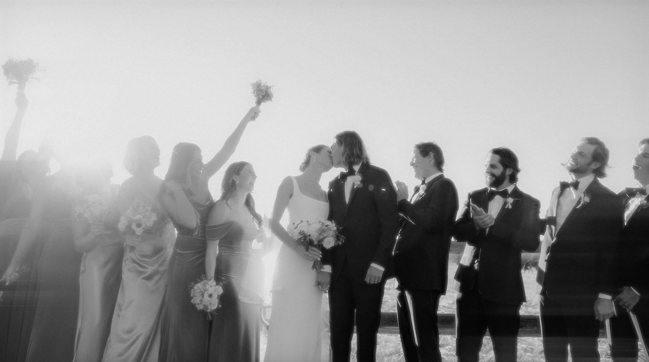black and white photo of a wedding party