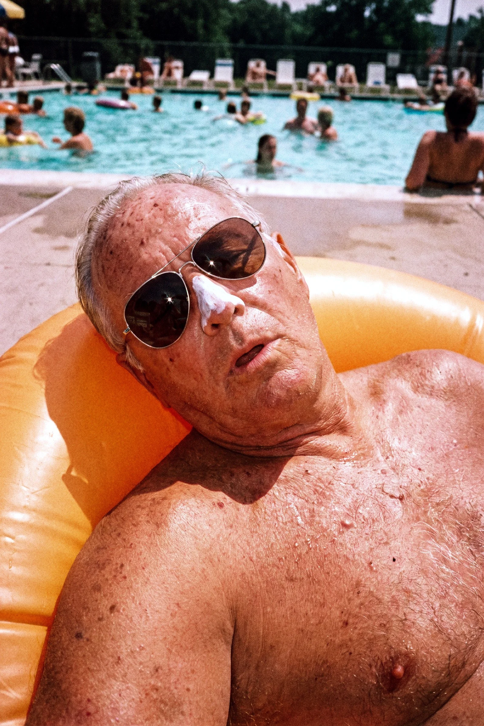old_man_man_super_tanned_asleep_on_an_inflatable_orange_ring_at_the_pool_edge_white_zinc_stripe_on__tzy0pw0zfdn1qoo2wbiq_1.jpg