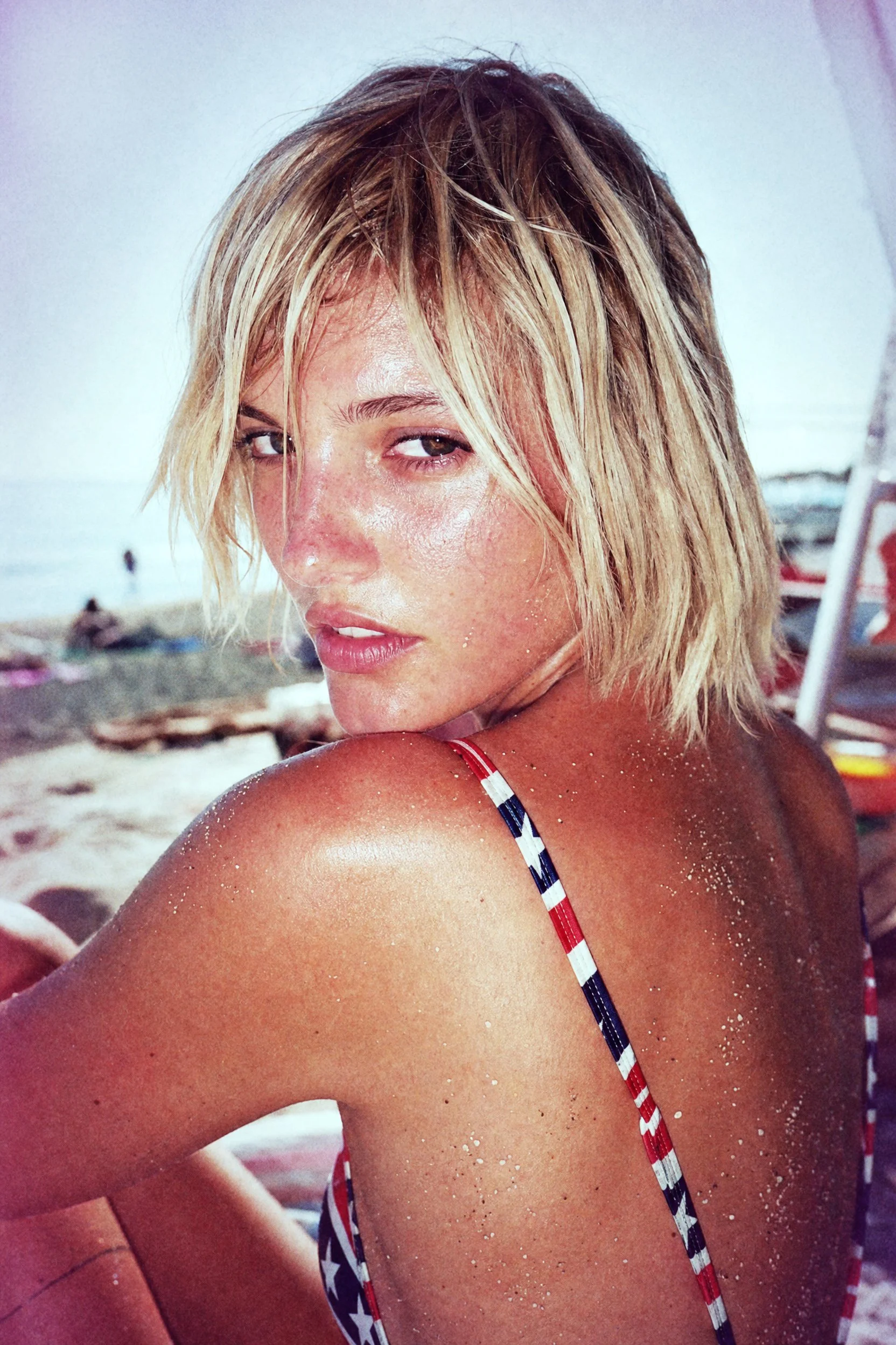 portrait_of_a_blonde_mica_argaaraz_look_alike_with_sunburnt_shoulder_and_back_with_sharp_american_f_hmo67lkbfnsed0qhy9j1_1.jpg