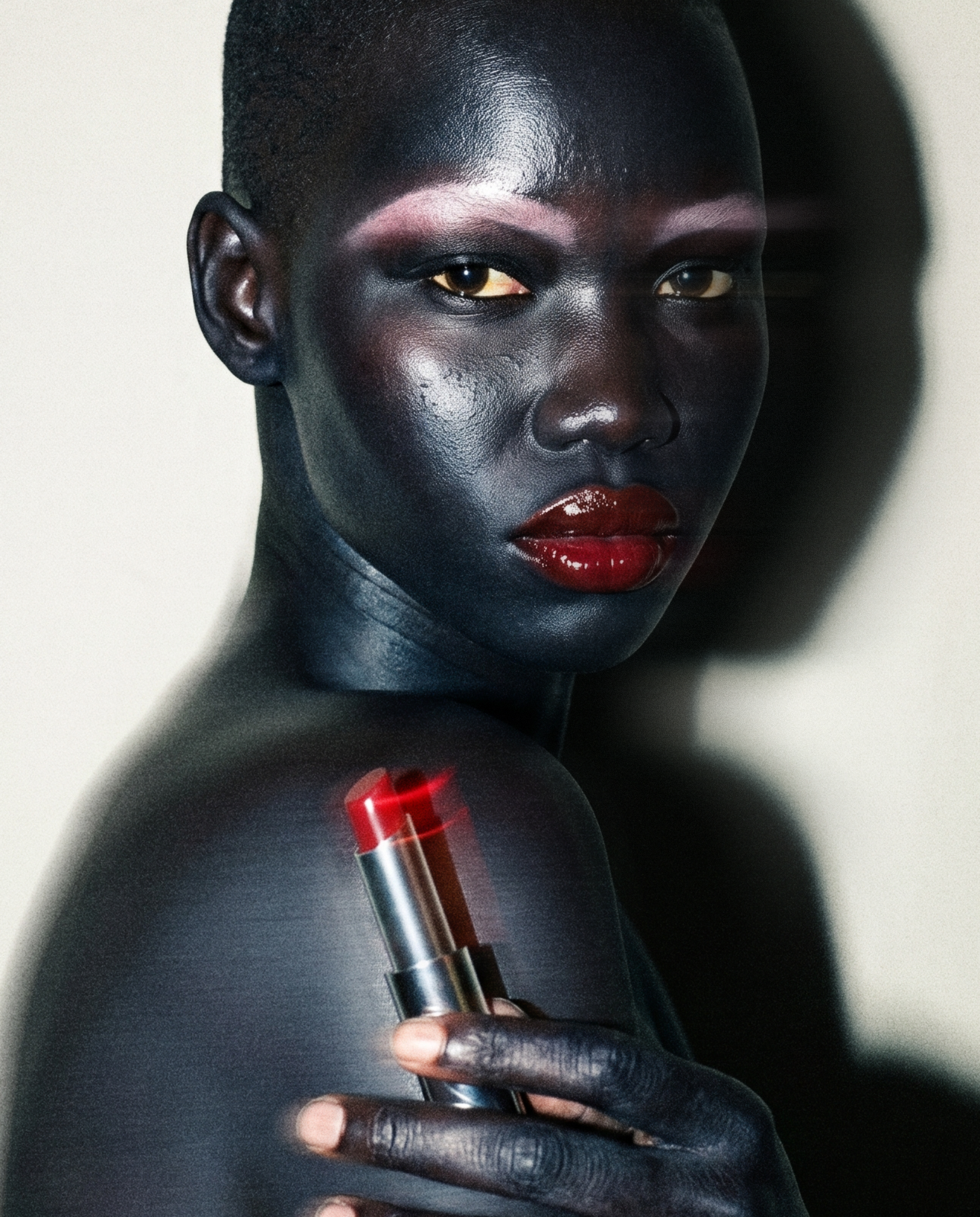 black woman model red lipstick glowing skin