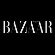 Close-up of the BAZAAR magazine logo on a black background