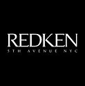 Redken logo with white text on a black background.