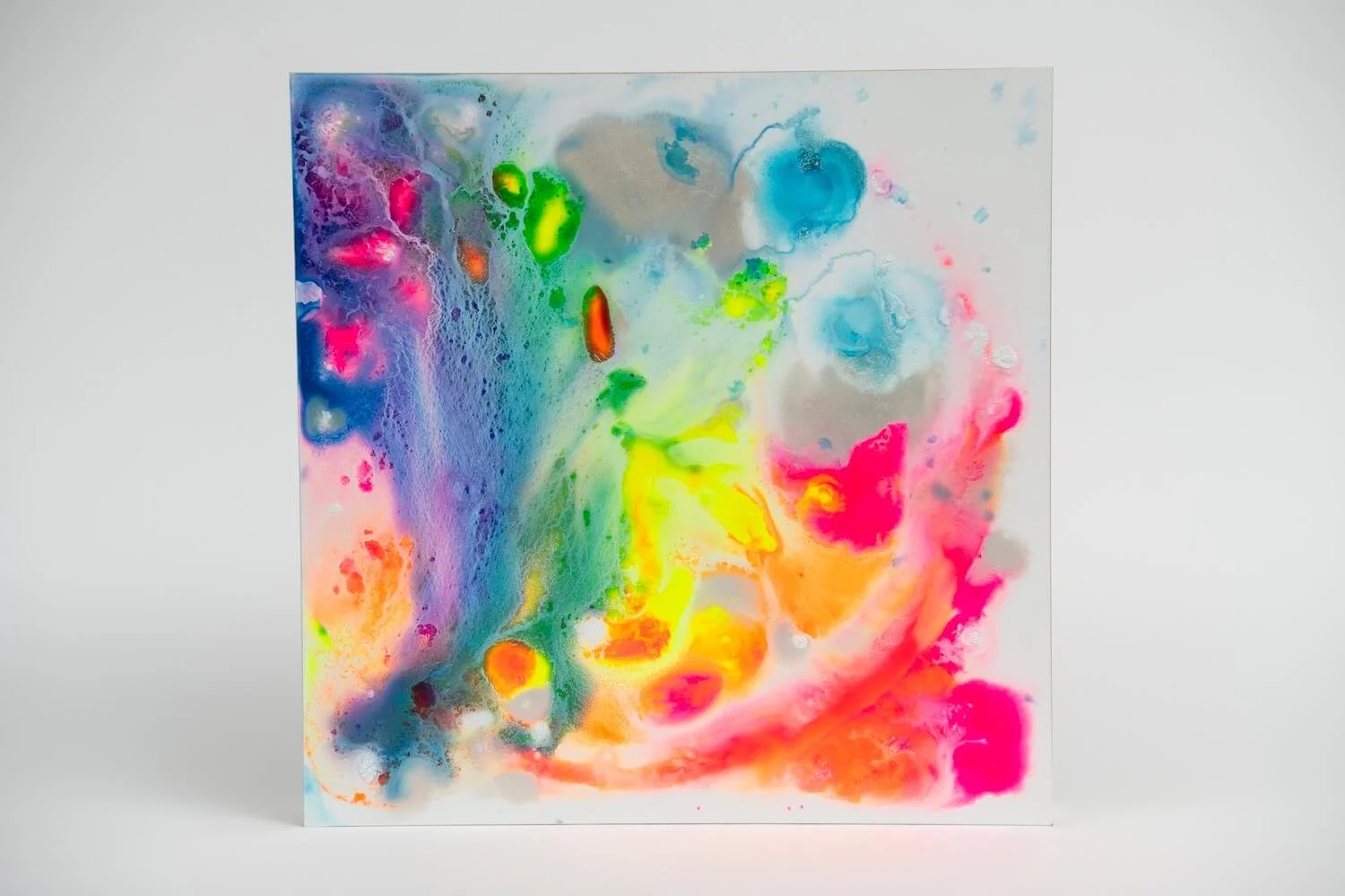 Rainbow Puddles, acrylic, pearl and inks on wooden panel, 30 x 30 cm