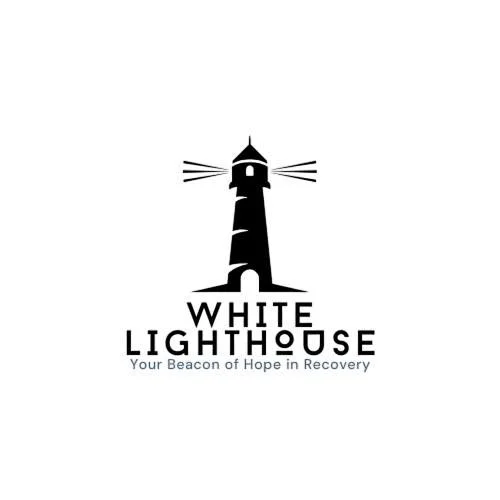 Logo of a lighthouse with light rays, accompanied by the text 'WHITE LIGHTHOUSE' and the tagline 'Your Beacon of Hope in Recovery'.