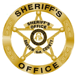 Badge for the Barrow County Sheriff's Office with a gold sheriff's star and text.
